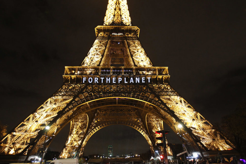 Слоган виставки «Для планети». Світлина: Getty Images.